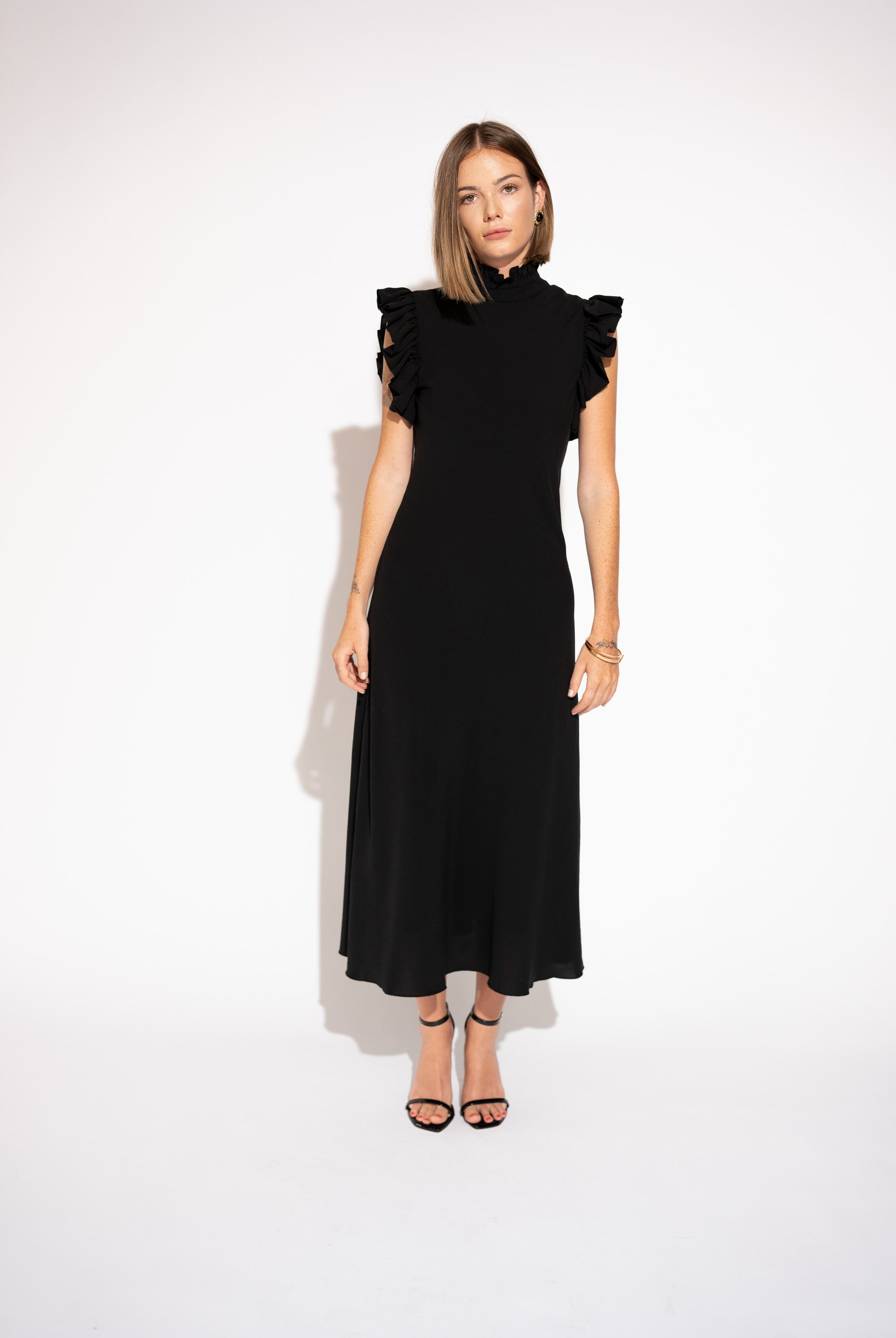Front view with white background of High-Neck Ruffle Sleeve Maxi Dress – Black.
