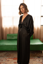 Front view of Floral Detail Satin Twill Maxi Dress – Black by Aisl.