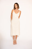 Front view with white background of Hand-Woven Cotton Midi Dress with Floral Detail – Ivory.