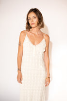 Front view with white background  of Hand-Woven Cotton Midi Dress with Floral Detail – Ivory.