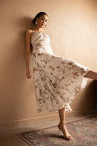 Second alternative view of Floral Halter Midi Dress in Tencel – Ivory.
