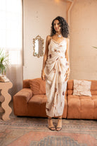 Front view of model wearing Floral Draped Tencel Maxi Dress – Ivory by Aisl.