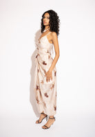 Side view of Floral Draped Tencel Maxi Dress – Ivory by Aisl.