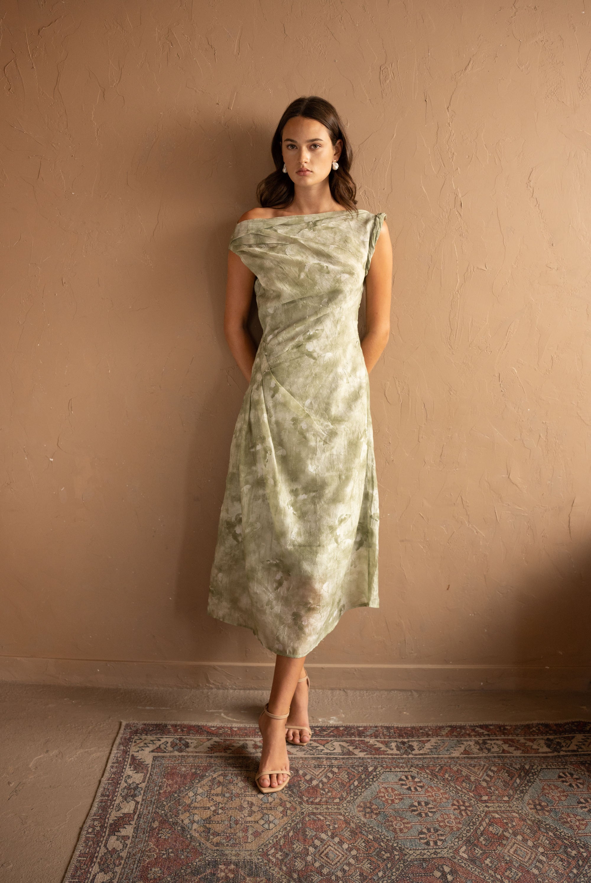 Front view of Draped Printed Midi Dress – Sage Green by Aisl.