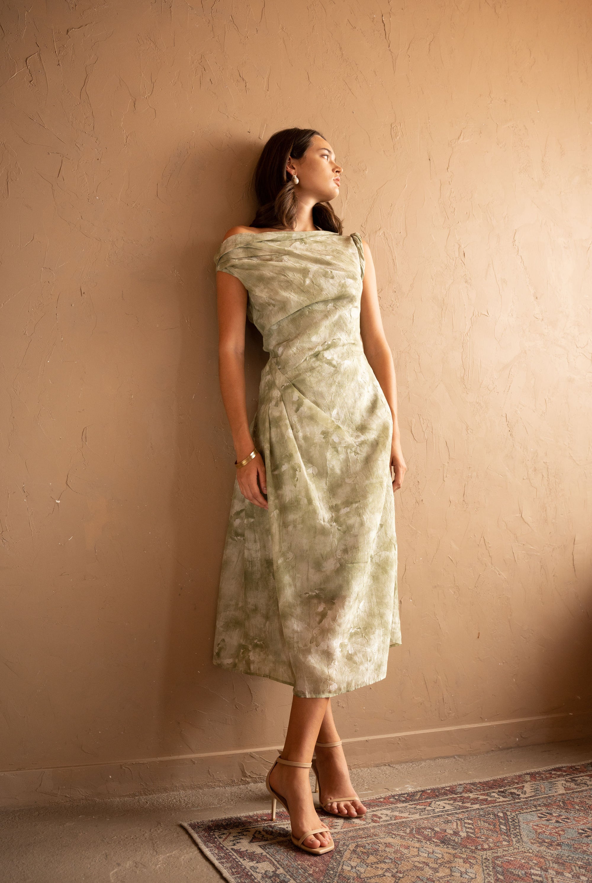 Front view of model wearing Draped Printed Midi Dress – Sage Green by Aisl.