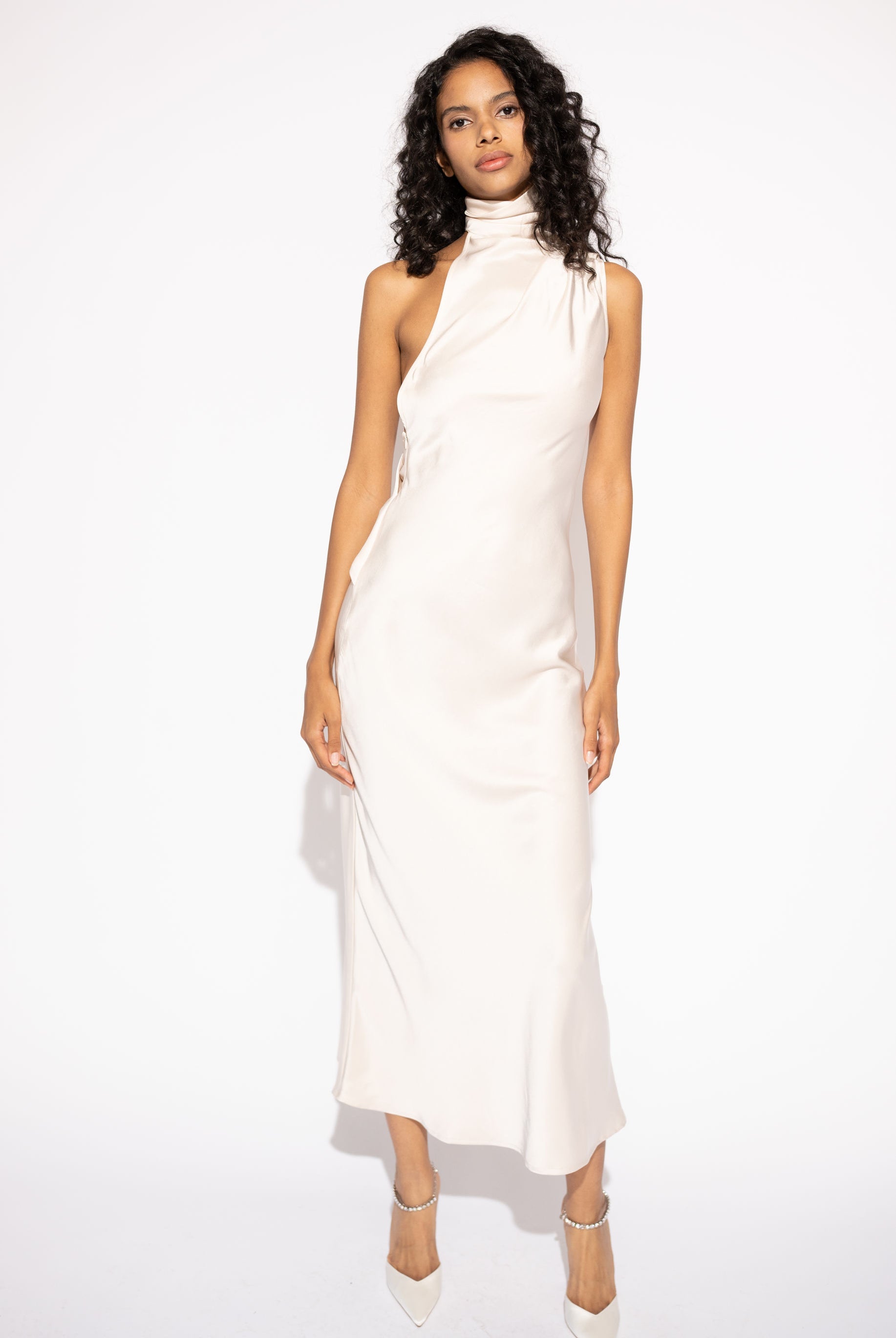 Front view with white background of Asymmetrical High-Neck Long Maxi Dress – Ivory by Aisl.