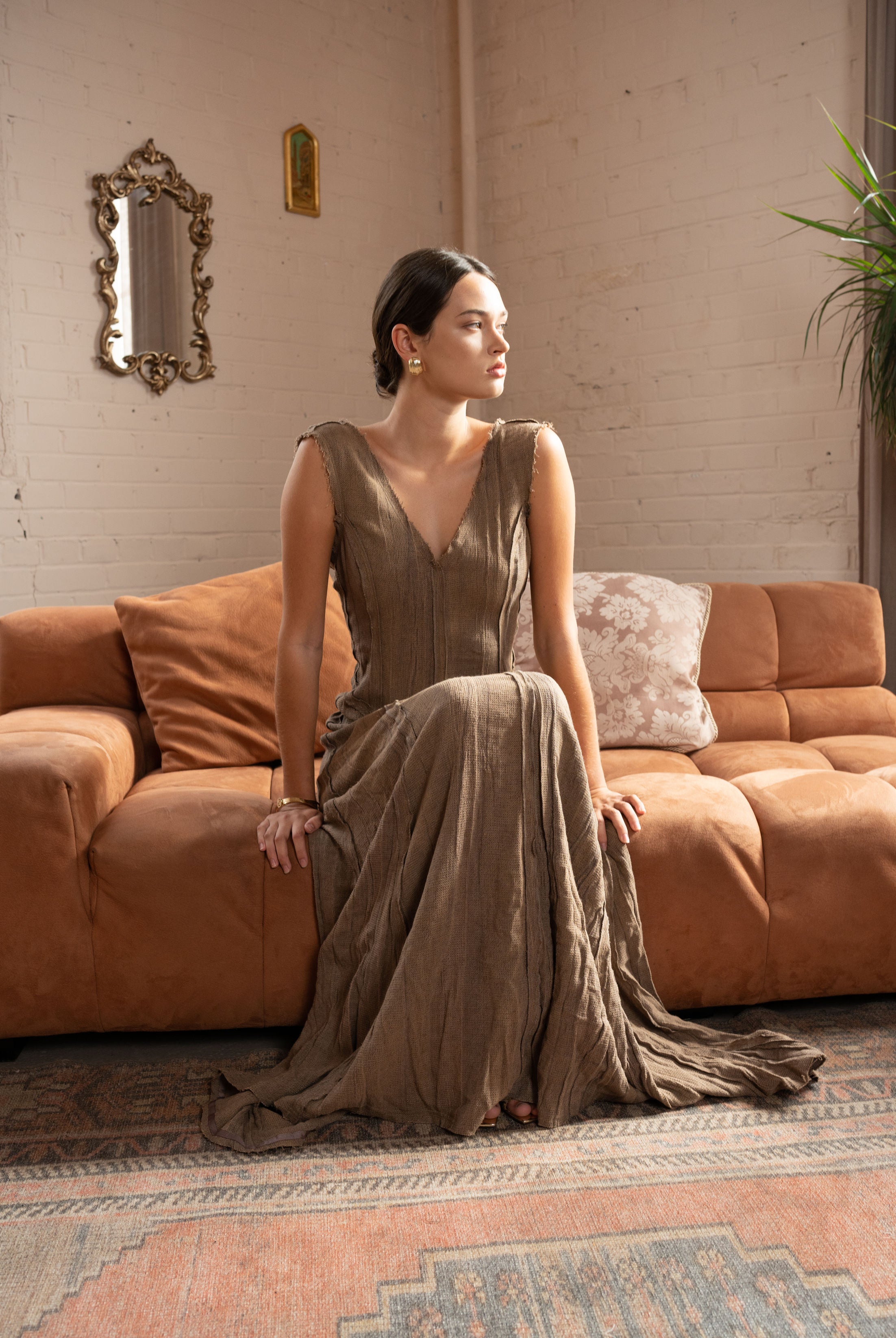 Linen-Blend V-Neck Maxi Dress with Natural Texture – Earth Brown, Model Sitting
