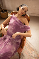 One-Shoulder Tie-Dye Pleated Maxi Dress – Lilac, Model Sitting - Alt