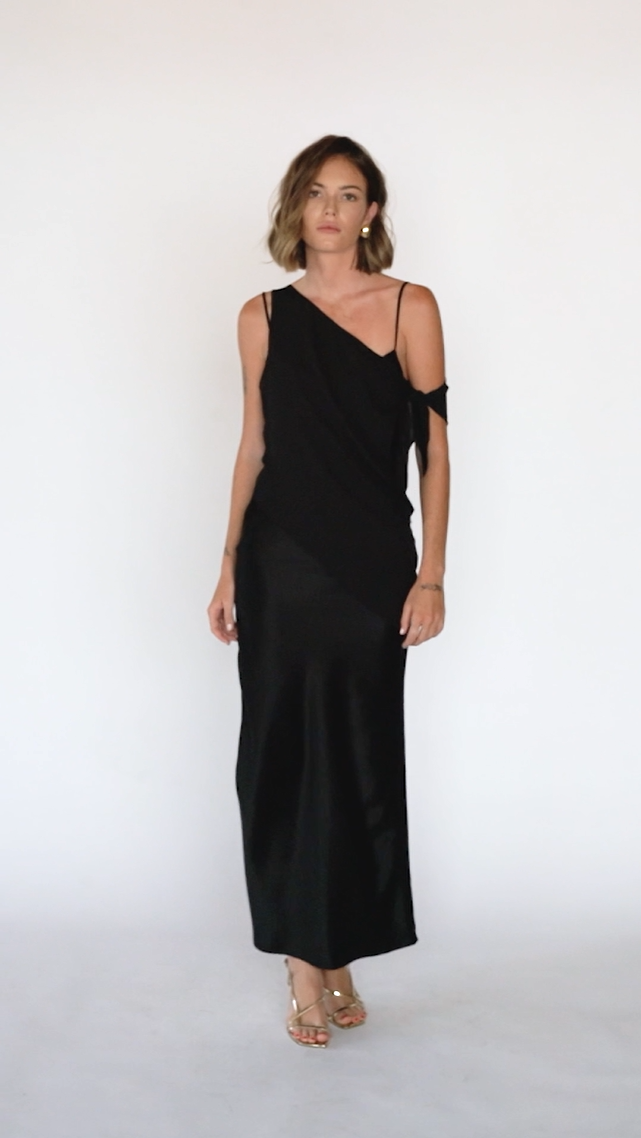 Video of model wearing Asymmetrical Mesh-Spliced Satin Maxi Dress – Black by Aisl.