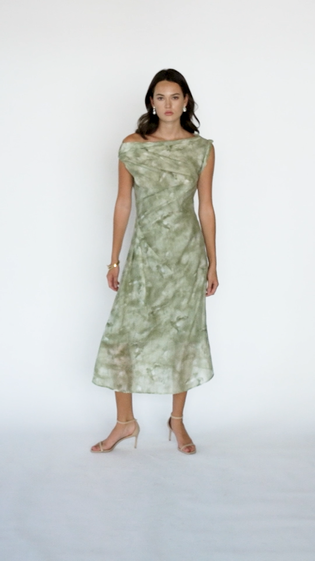Video of model Draped Printed Midi Dress – Sage Green by Aisl showing all angles.