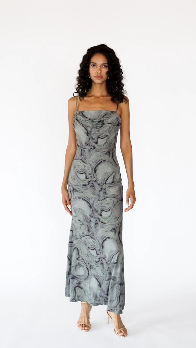 Video of model wearing Flowy Printed Maxi Dress with Spaghetti Straps – Marble Grey.