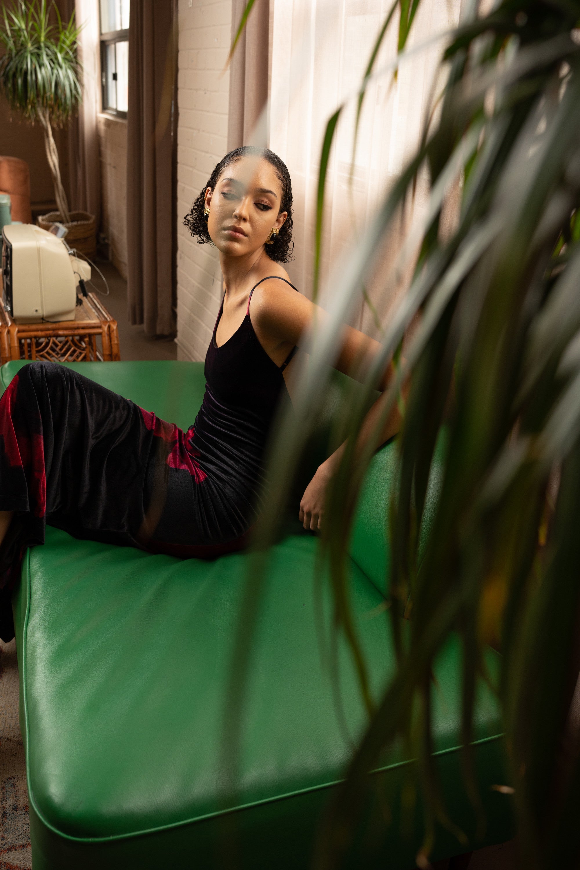 Silky Soft Velvet Floral Maxi Dress – Black and Red, Model Sitting