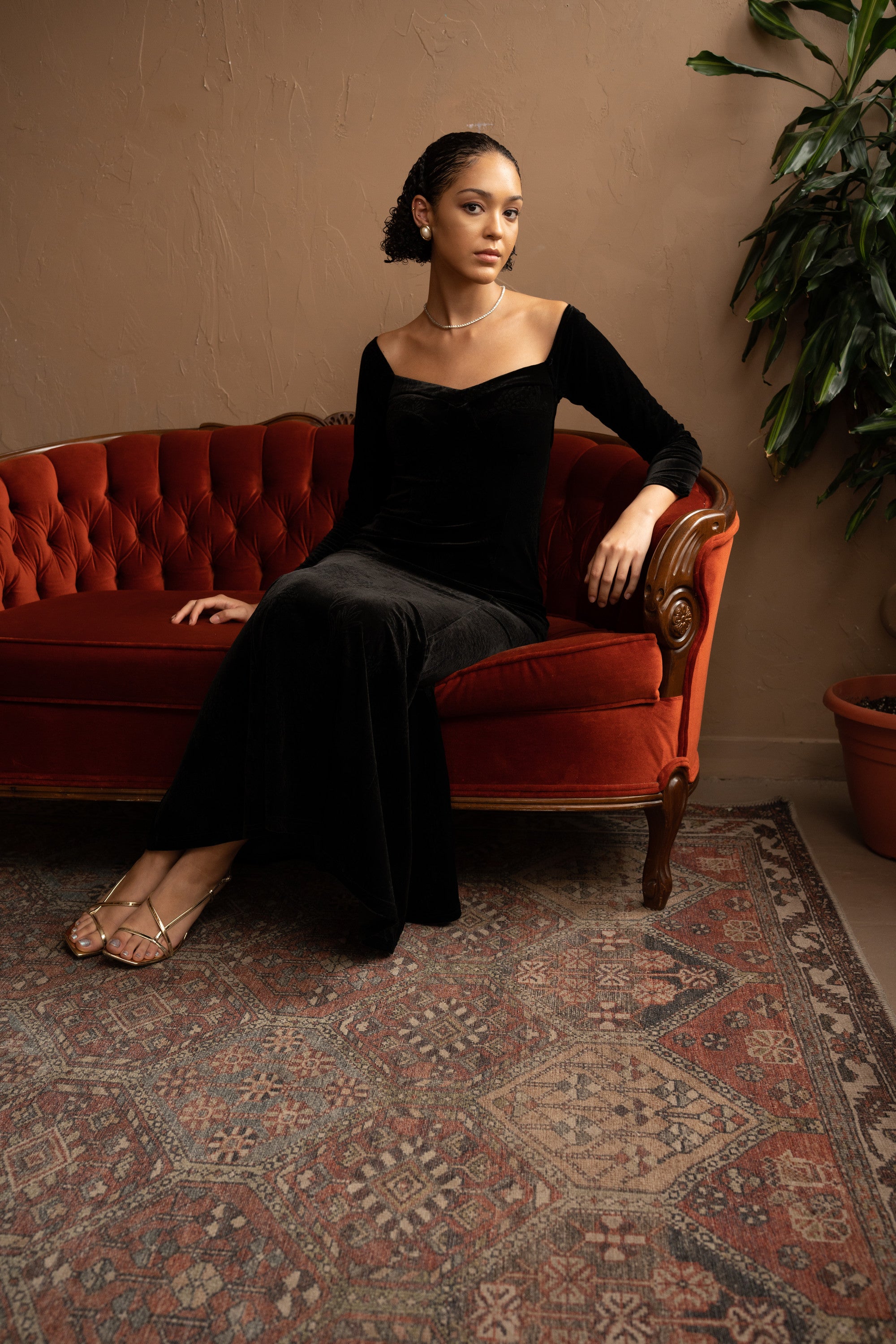 Off-Shoulder Velvet Jacquard Maxi Dress – Black, Model Sitting