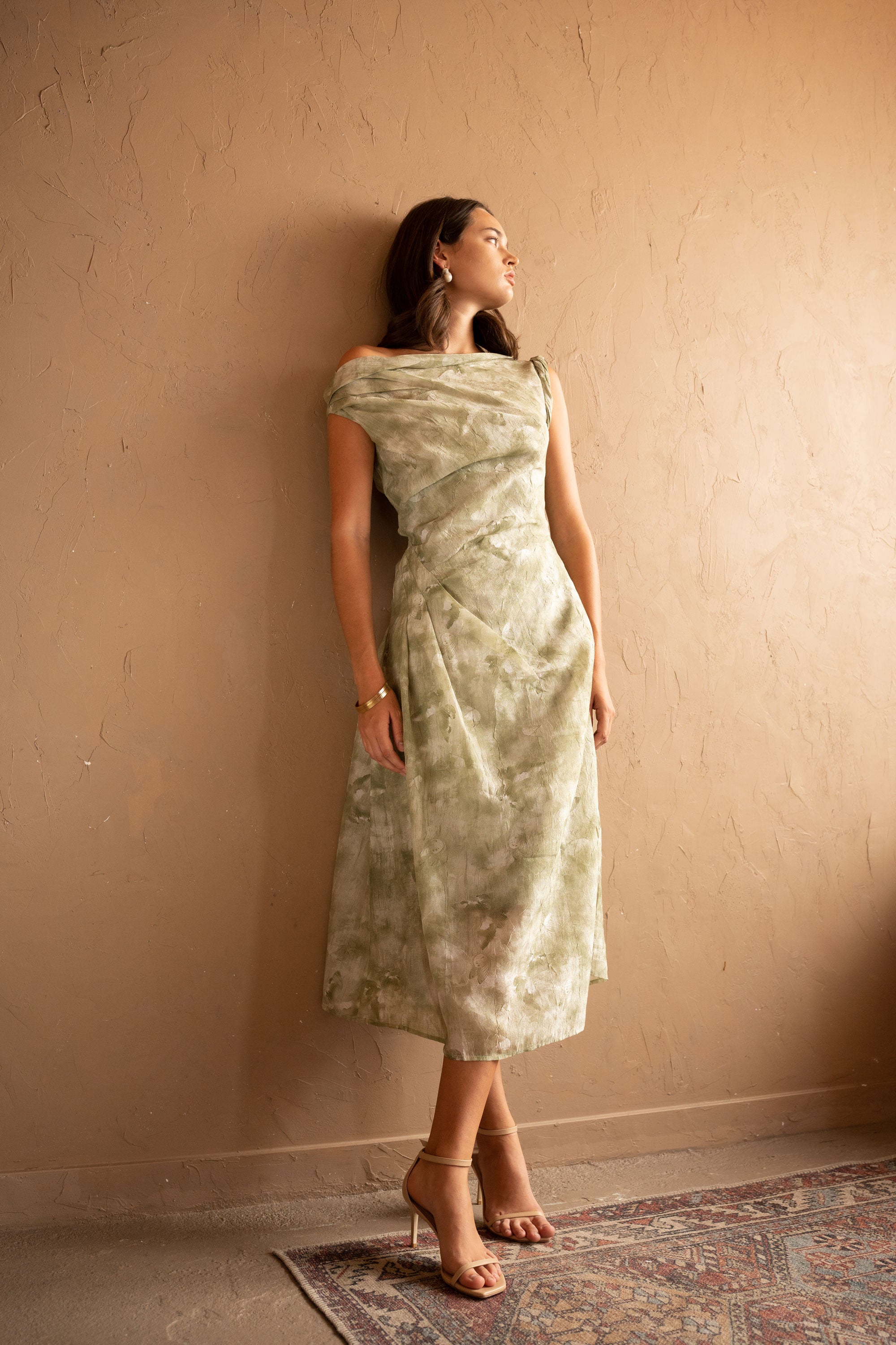 Front view of model wearing Draped Printed Midi Dress – Sage Green by Aisl. 