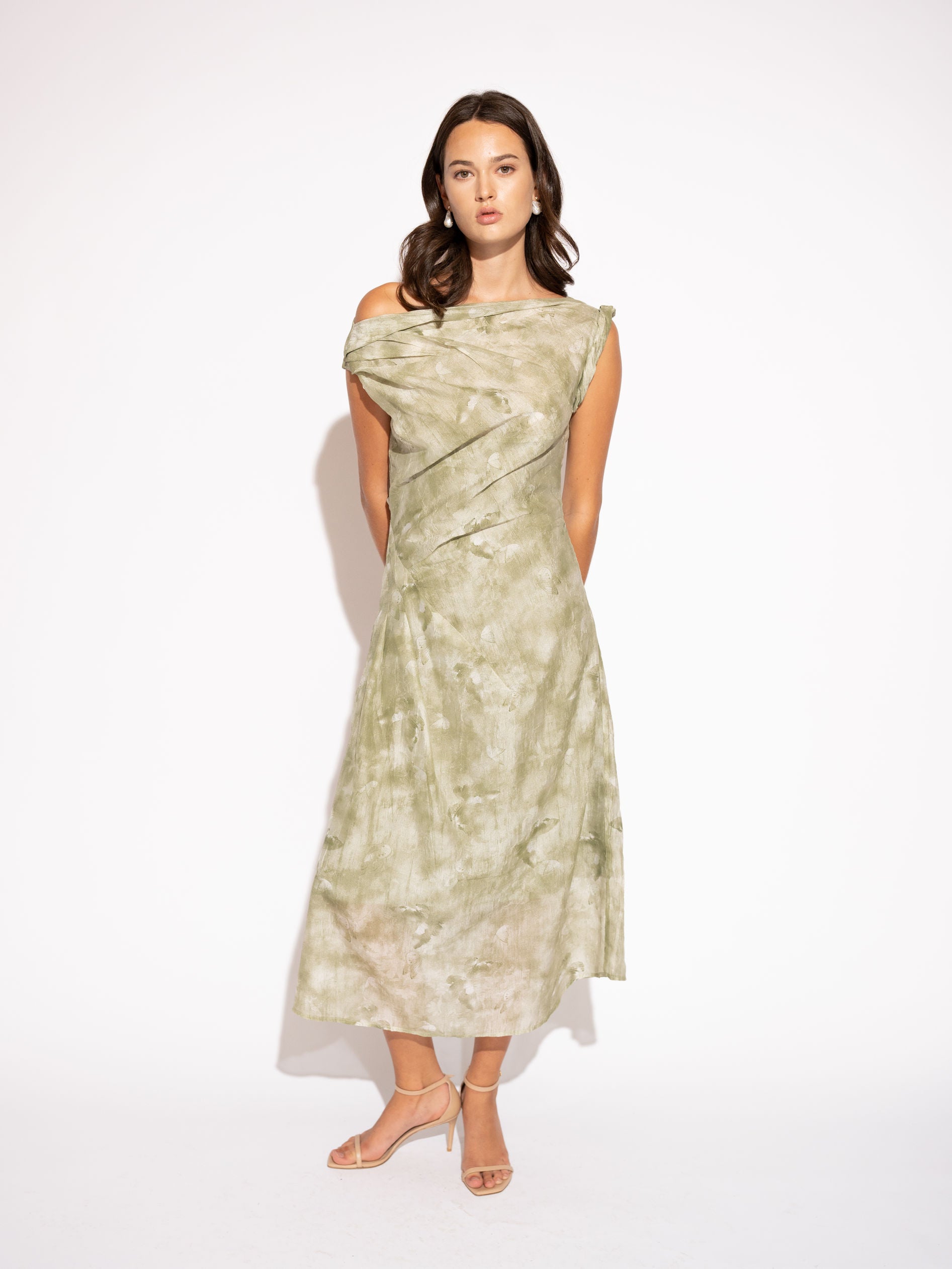 Front view with white background of Draped Printed Midi Dress – Sage Green by Aisl. 